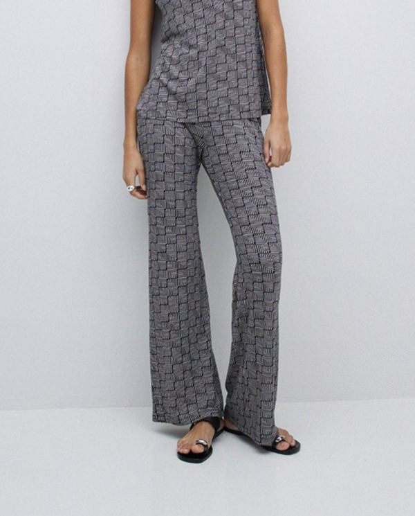 Pantalone in jersey elastico in vita, bianco e nero fantasia geometrica