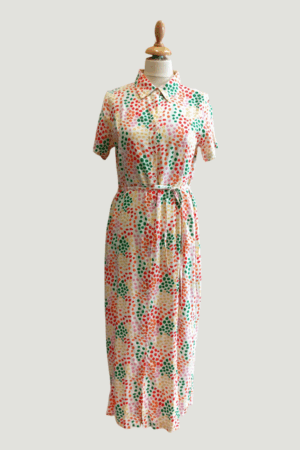 Abito donna con fantasia geometrica su base beige